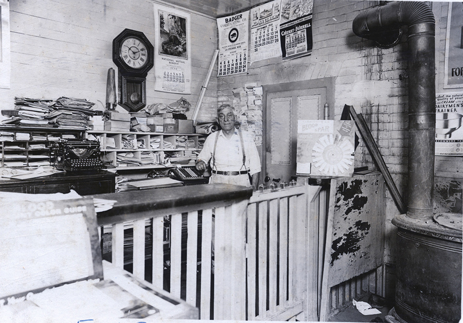Frederick Borm in his office, the former Knapp, Stout & Co. Company pay sation in 1935. Photo courtesy of the Dunn County Historical Society.