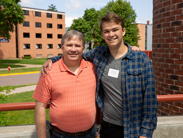 Brian Wahl, a computer science major from Chanhassen, Minn., attends orientation with his father.