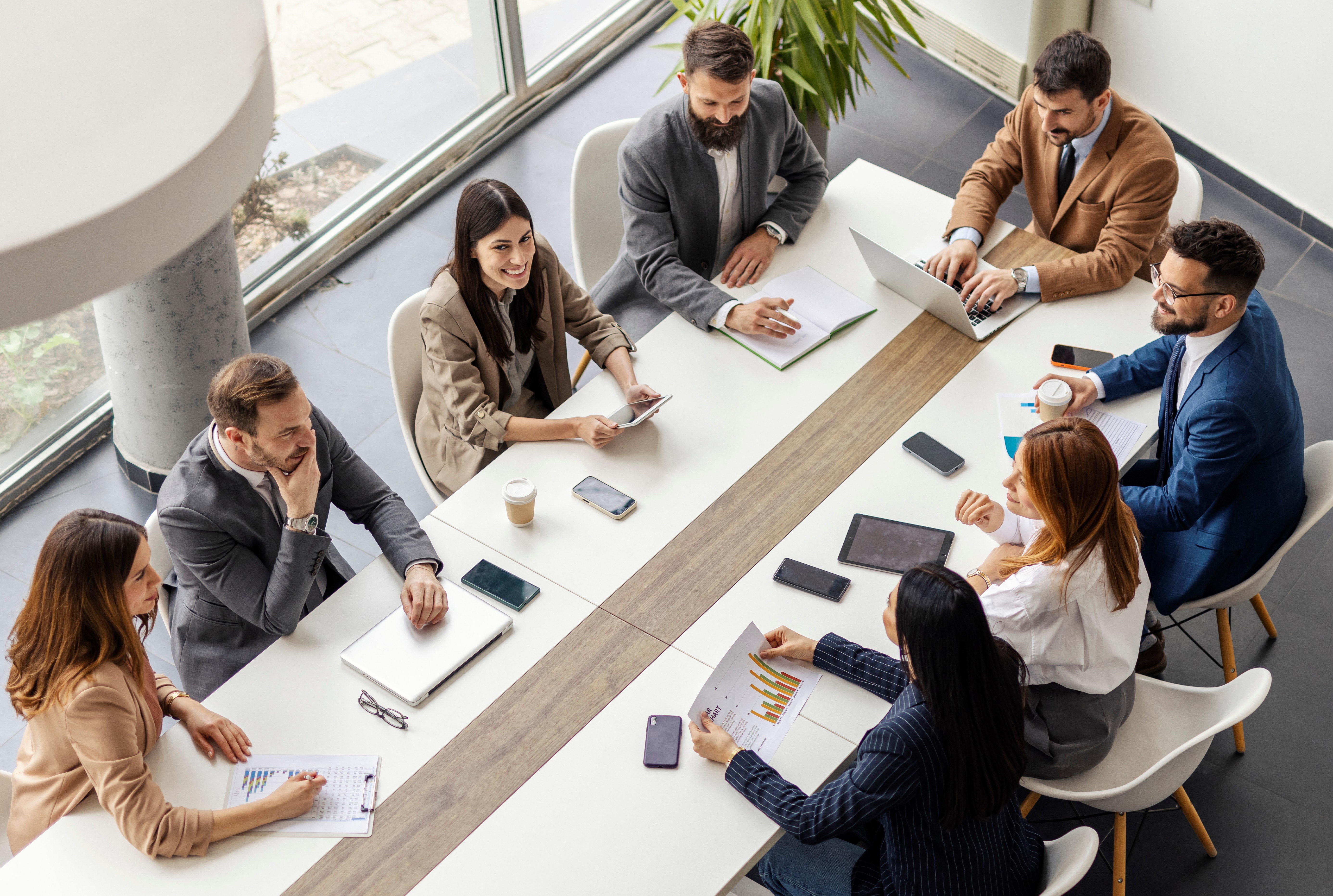 People gathered around a table for leadership meeting