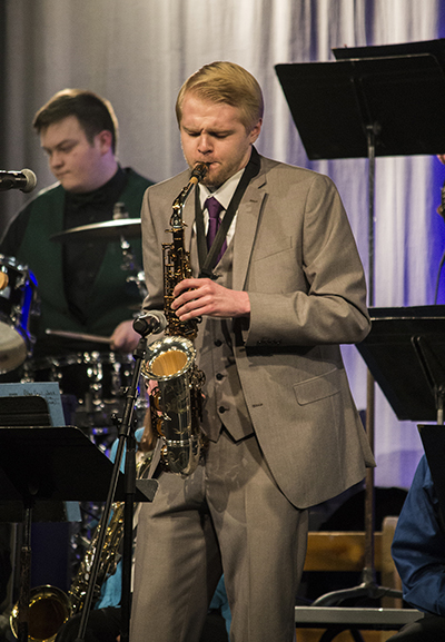 Student Lukas Medin plays saxophone in the Blue Devil Jazz Orchestra.