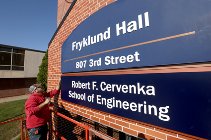 A Robert F. Cervenka School of Engineering sign is installed on the south side of UW-Stout’s Fryklund Hall.