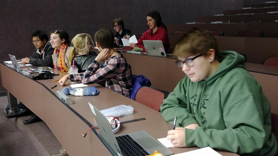 Comic Creators club members work on their valentines fundraiser.