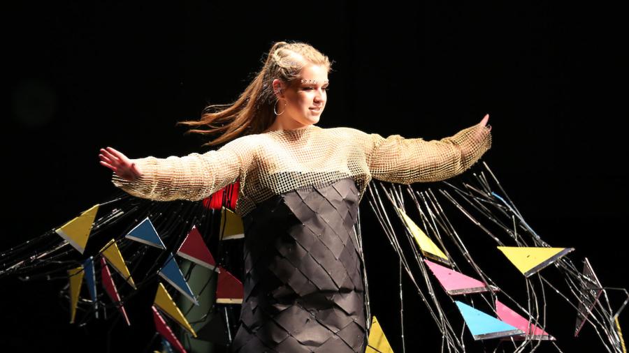 Jackie Miller modeling her design at Fashion Without Fabric.