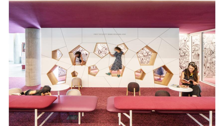 Interior design mockup of a library with children playing.