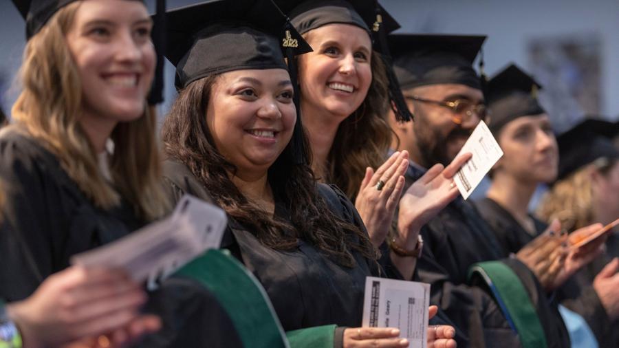 Graduates applaud during one of the three commencement ceremonies May 6 at UW-Stout.