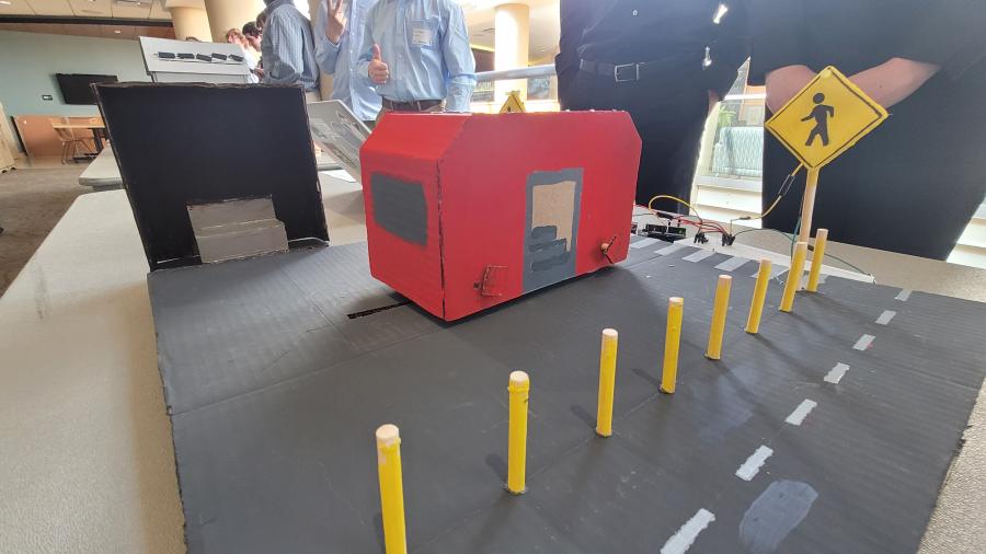 Gabriel Morken, Ann Moss, Christian Bretey and Christian Klein's trolley prototype