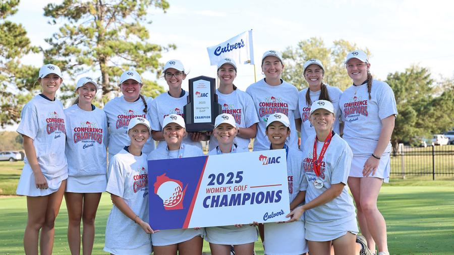 Golf team with trophy