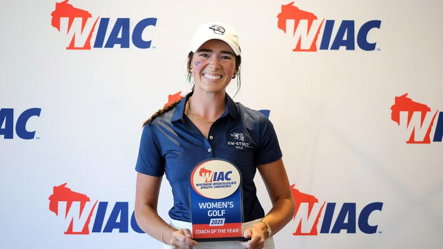 Woman holding award