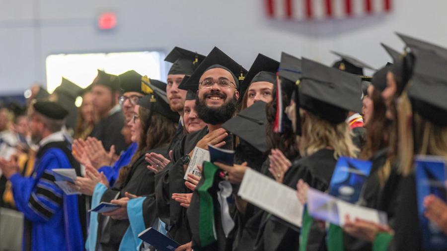 Master's degree graduates celebrate at commencement