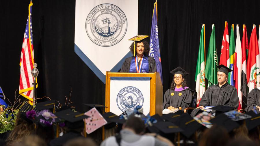 Woman speaking on stage
