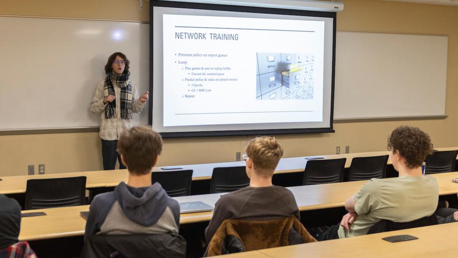 Students presenting an AI version of the board game Othello