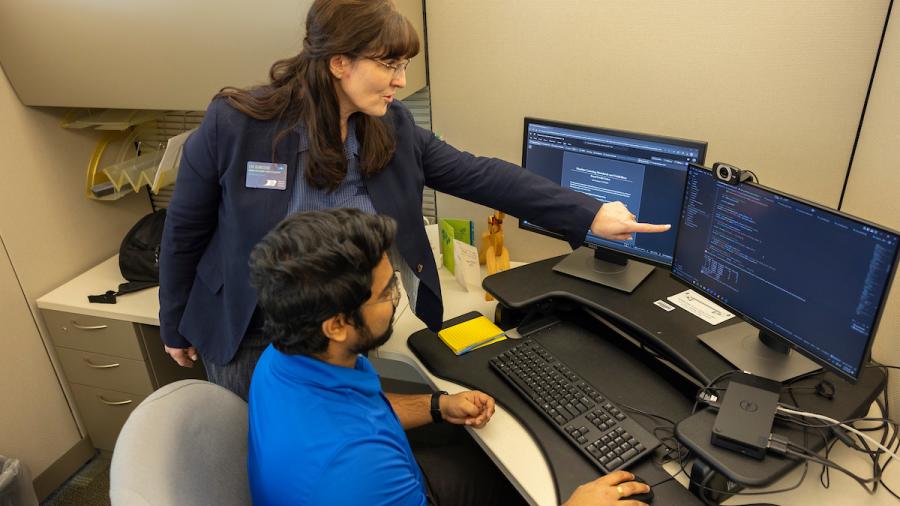 Two people in office