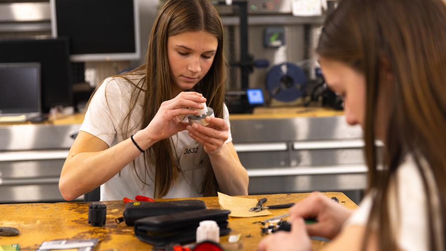 Students work on a engineering challenge during the SkillsUSA Regional Competition