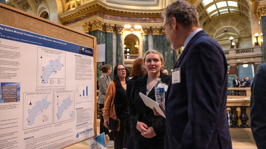People speaking at research event