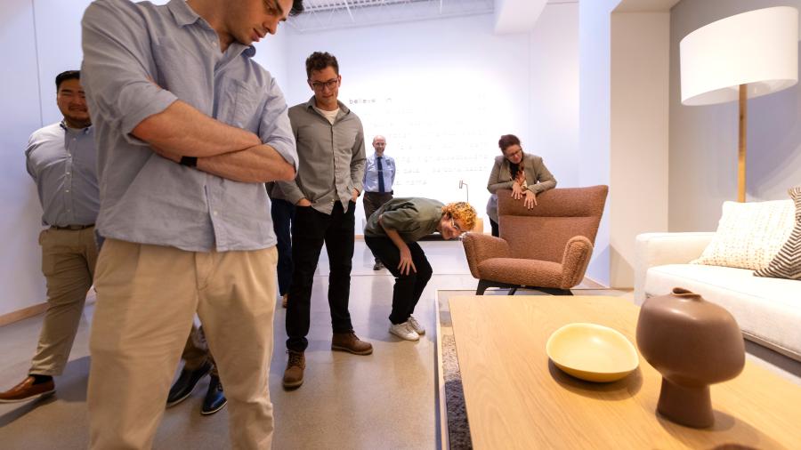 People looking at table