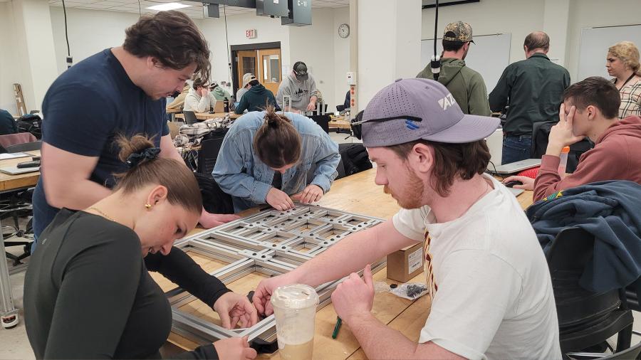 Manufacturing and mechanical engineering students work on their capstone project