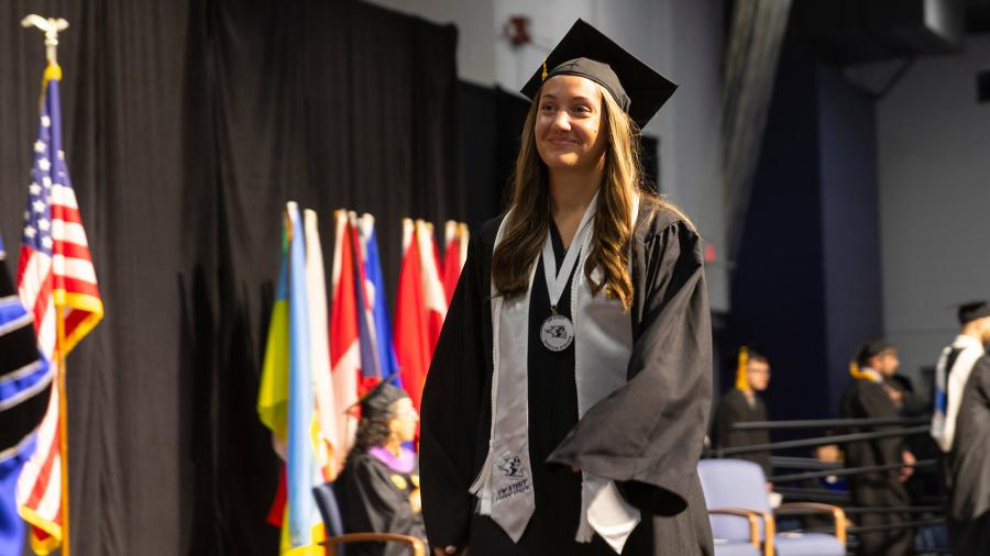 Woman in graduation regalia