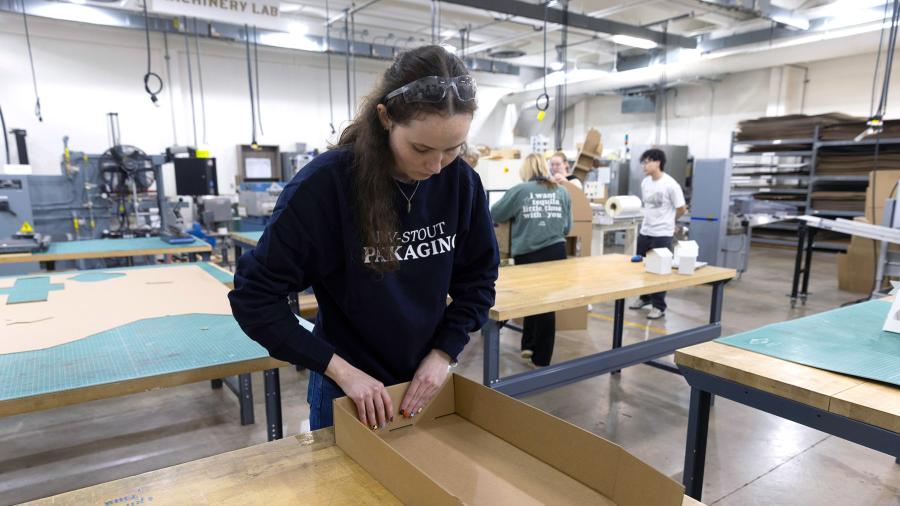 Woman folding box