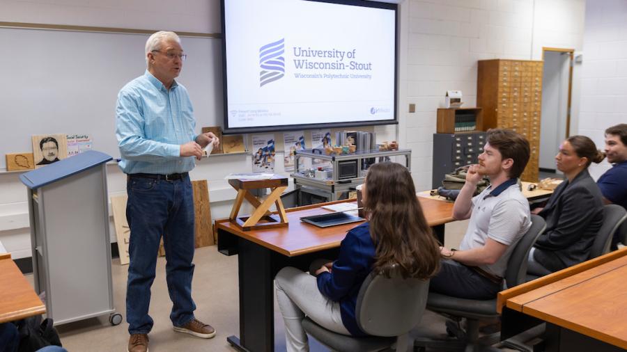 Professor Emeritus Jerome Johnson speaks during a capstone presentation