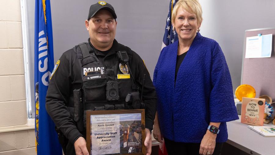 Officer Kevin Goodell and Chancellor Katherine Frank