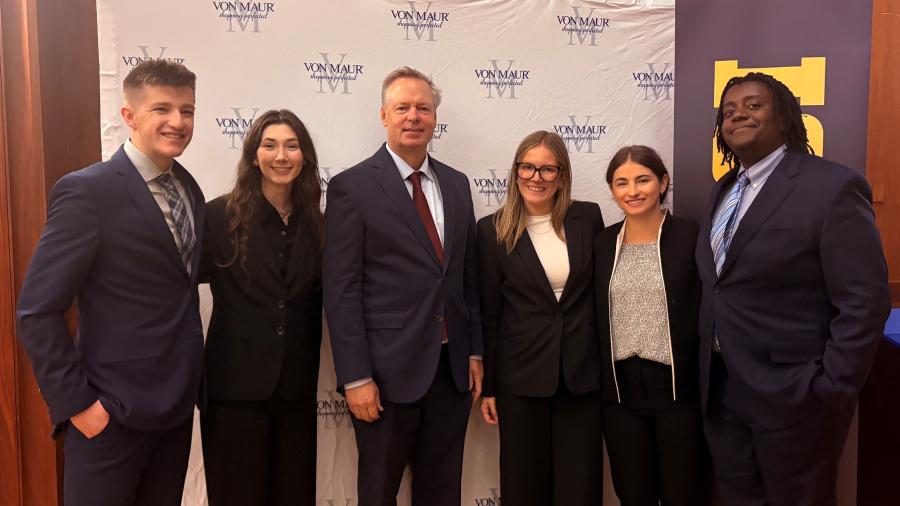AMA student team with Jim Von Maur, center