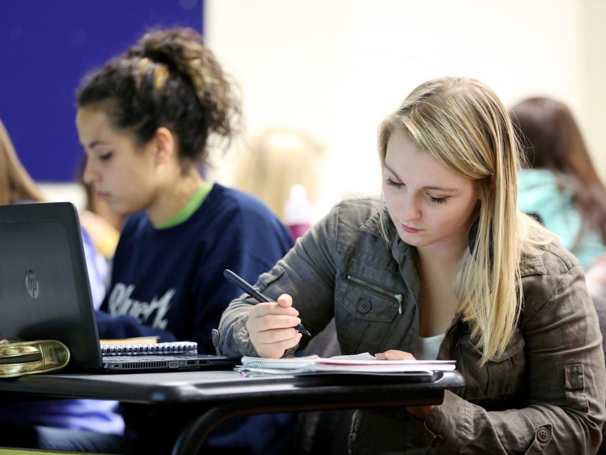 Human Development and Family Studies Associate Professor Amanda Barnett's Family Policy class is photographed in Heritage Hall 