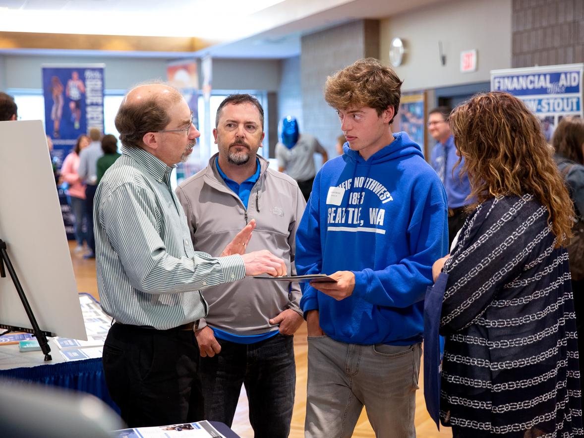 First-year student Grayson Barrett, a construction major from Mosinee, discusses his academic plans with Associate Dean Chris Bendel during UW-Stout’s recent orientation and registration sessions.