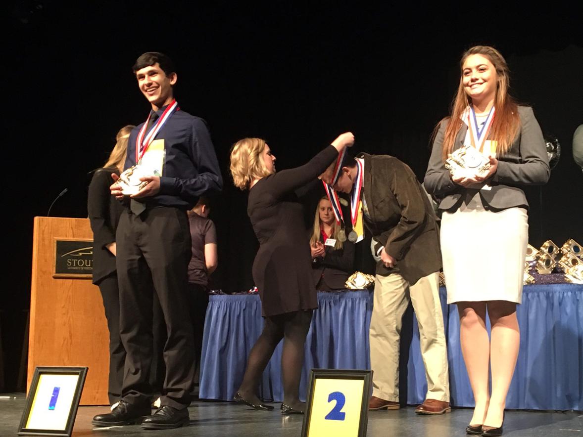 High school students receive awards at a recent DECA District I Career Development Conference at UW-Stout.
