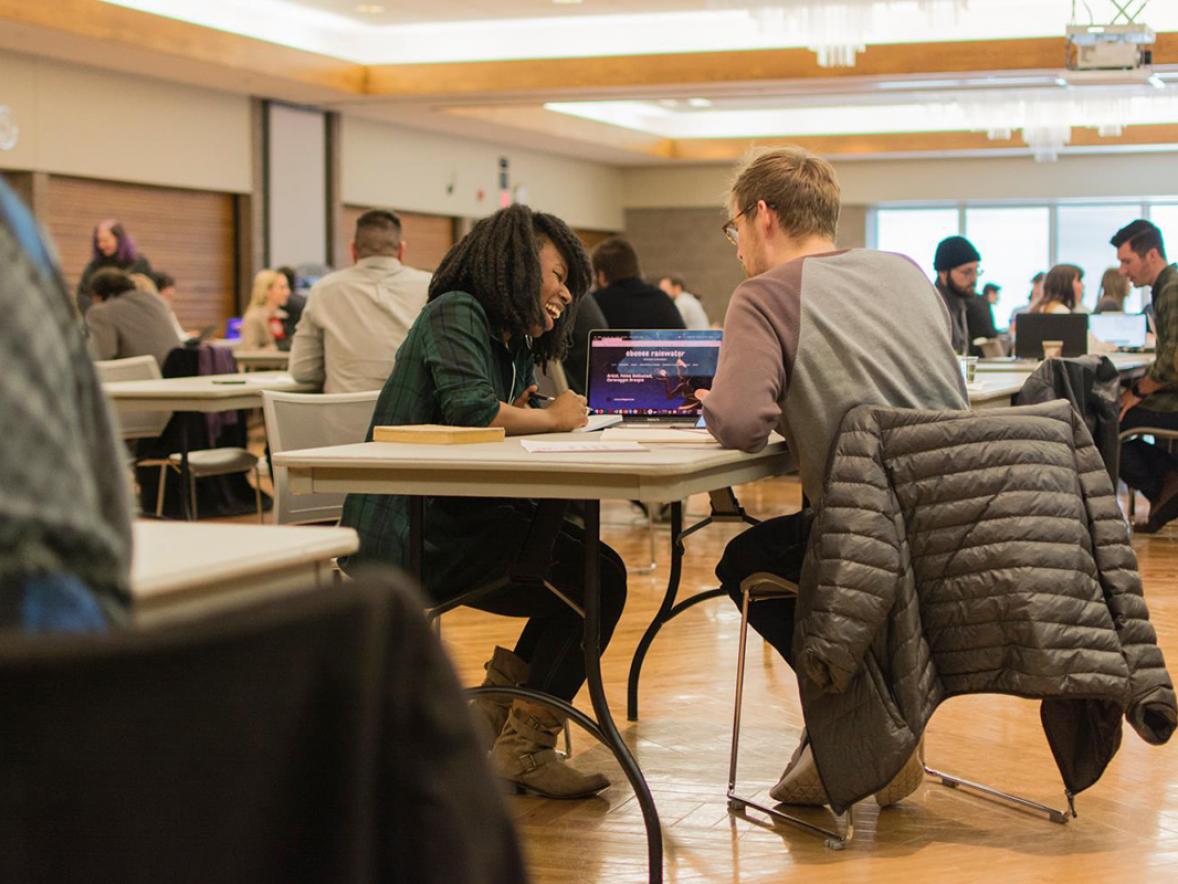 Students taking part in a portfolio review during Art and Design Week in 2019.