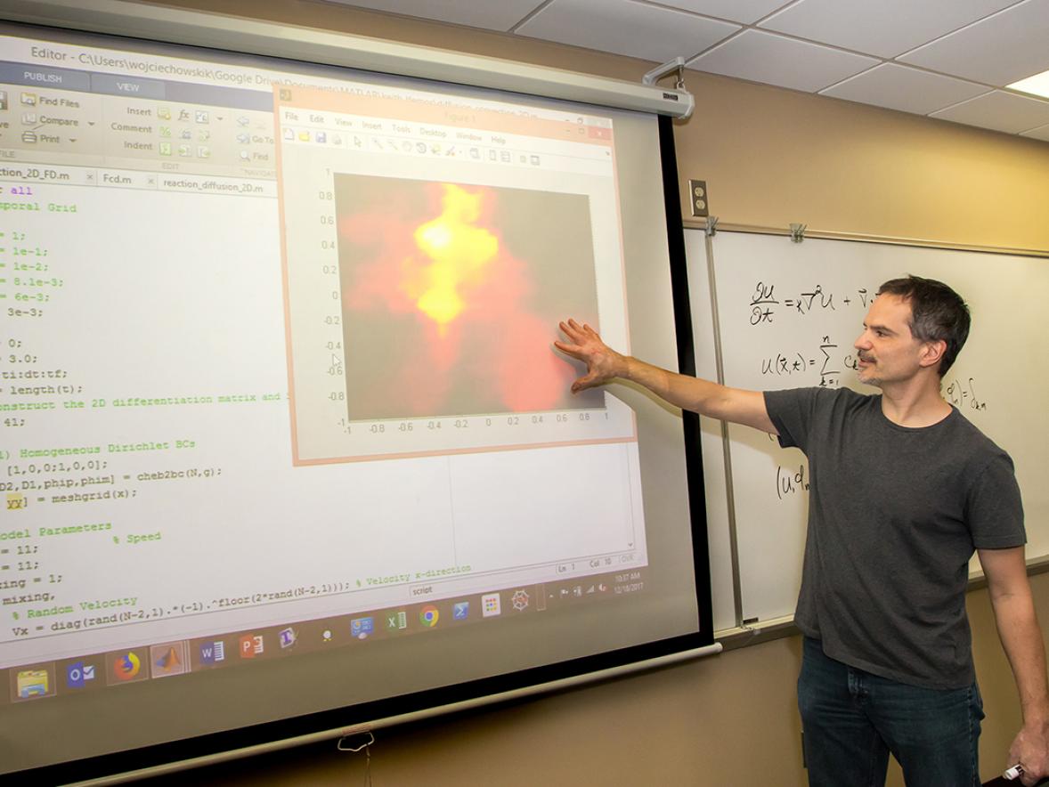 Keith Wojciechowski, mathematics, statistics and computer science, who was recently promoted to a full professor at UW-Stout, teaches a class in 2017. A total of 28 faculty received promotions or tenure from the Board of Regents.