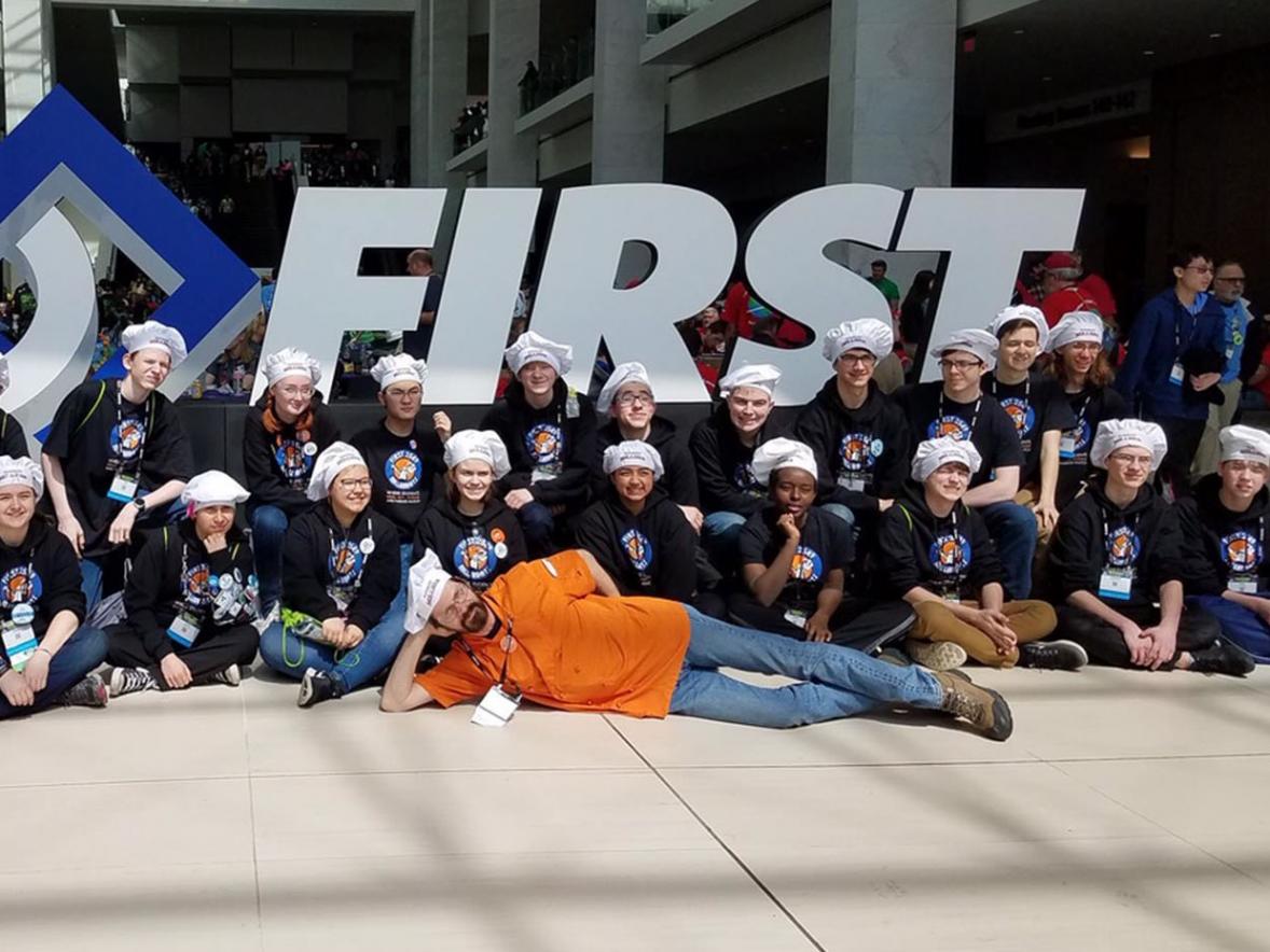 Technology education teacher Mark Le Feber and the Washburn Millerbots.