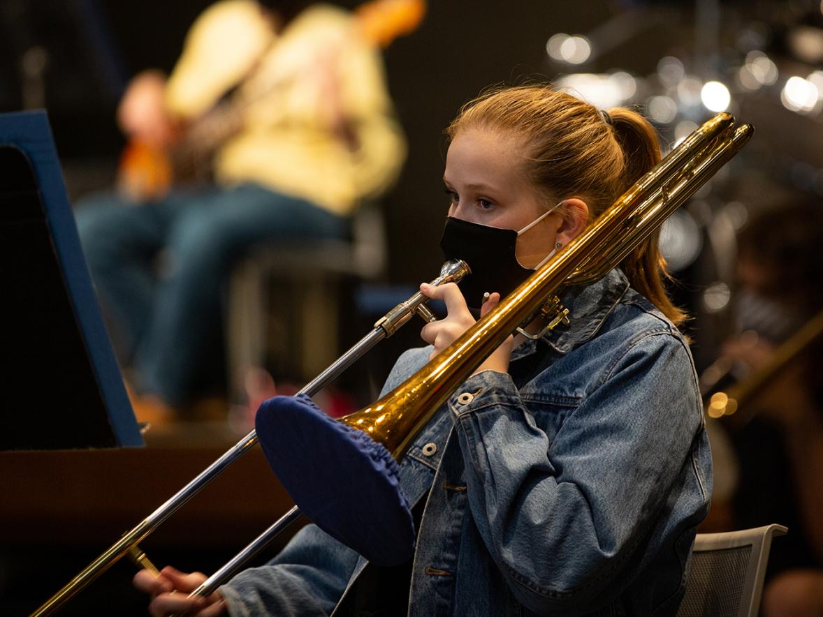 Trombonist Jamie Anderson practices with the Jazz Orchestra this fall.