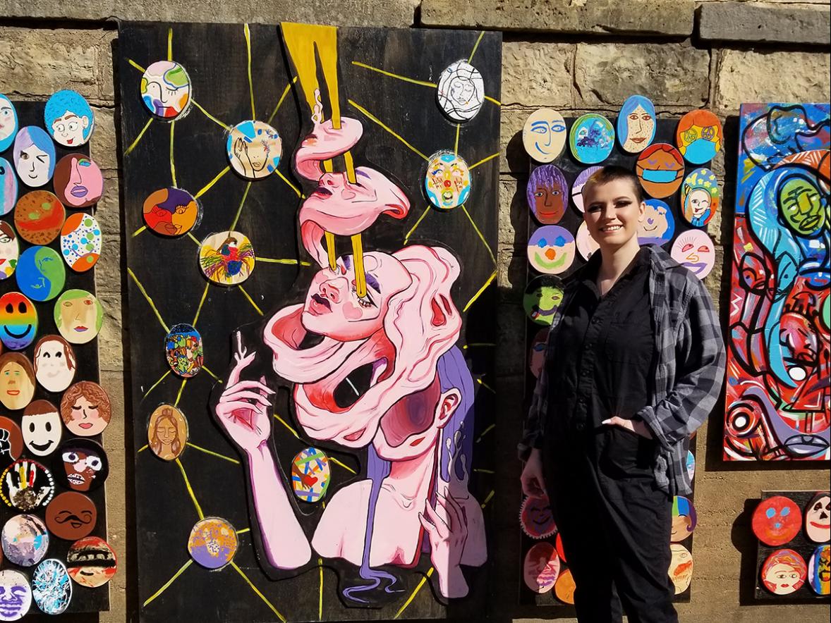 UW-Stout student Stephanie Howell with her part of the Project 30.1 mural in Hudson, name for the distance from where George Floyd died. Photo courtesy Stephanie Howell