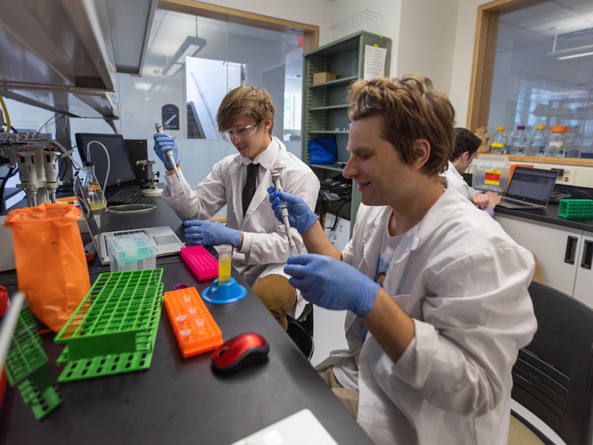 ABMB students Tanner Thompson and Joshua Rusnak extract DNA from E. coli.