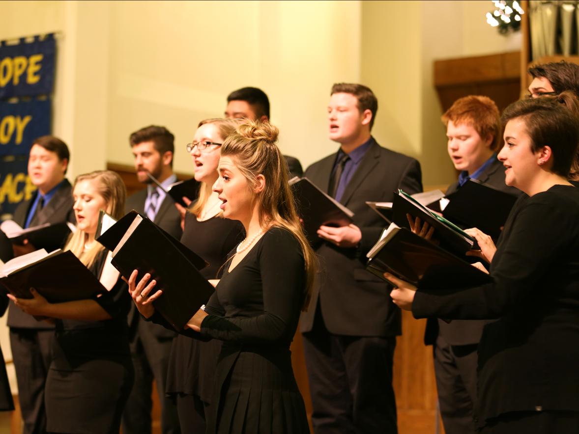 Students perform during a choir concert in 2016