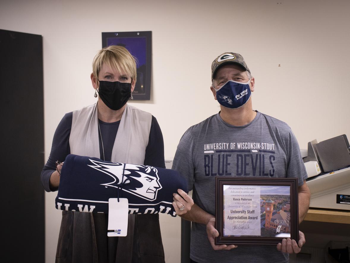 Rance Pederson, right, with Chancellor Katherine Frank receiving the November University Staff Senate Appreciation Award.
