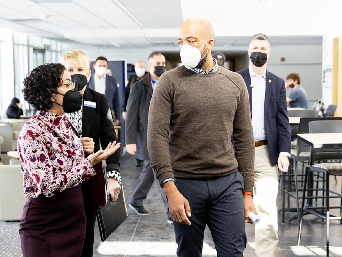 Lt. Gov. Mandela Barnes talks with UW-Stout Provost Glendali Rodriguez, followed by Chancellor Katherine Frank, while visiting campus Monday, Feb. 28.