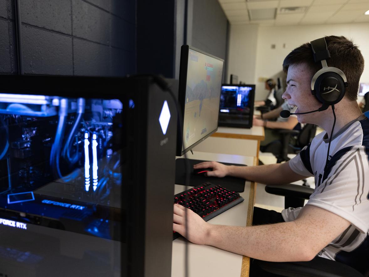 UW-Stout esports team players compete from their new arena in Heritage Hall. The arena includes new computers, monitors and chairs that are standard in competitive gaming.