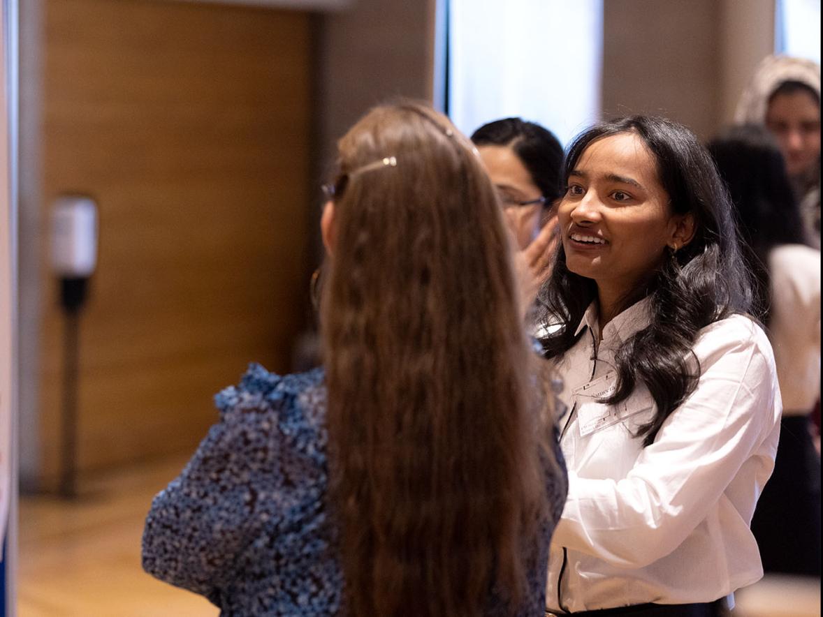A student presents at Research Day.