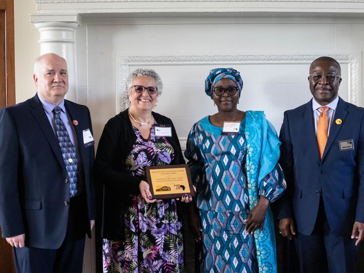 Bob Butterfield, Kim Uetz, Ambassador Mahama and Mike Essien at the award ceremony.
