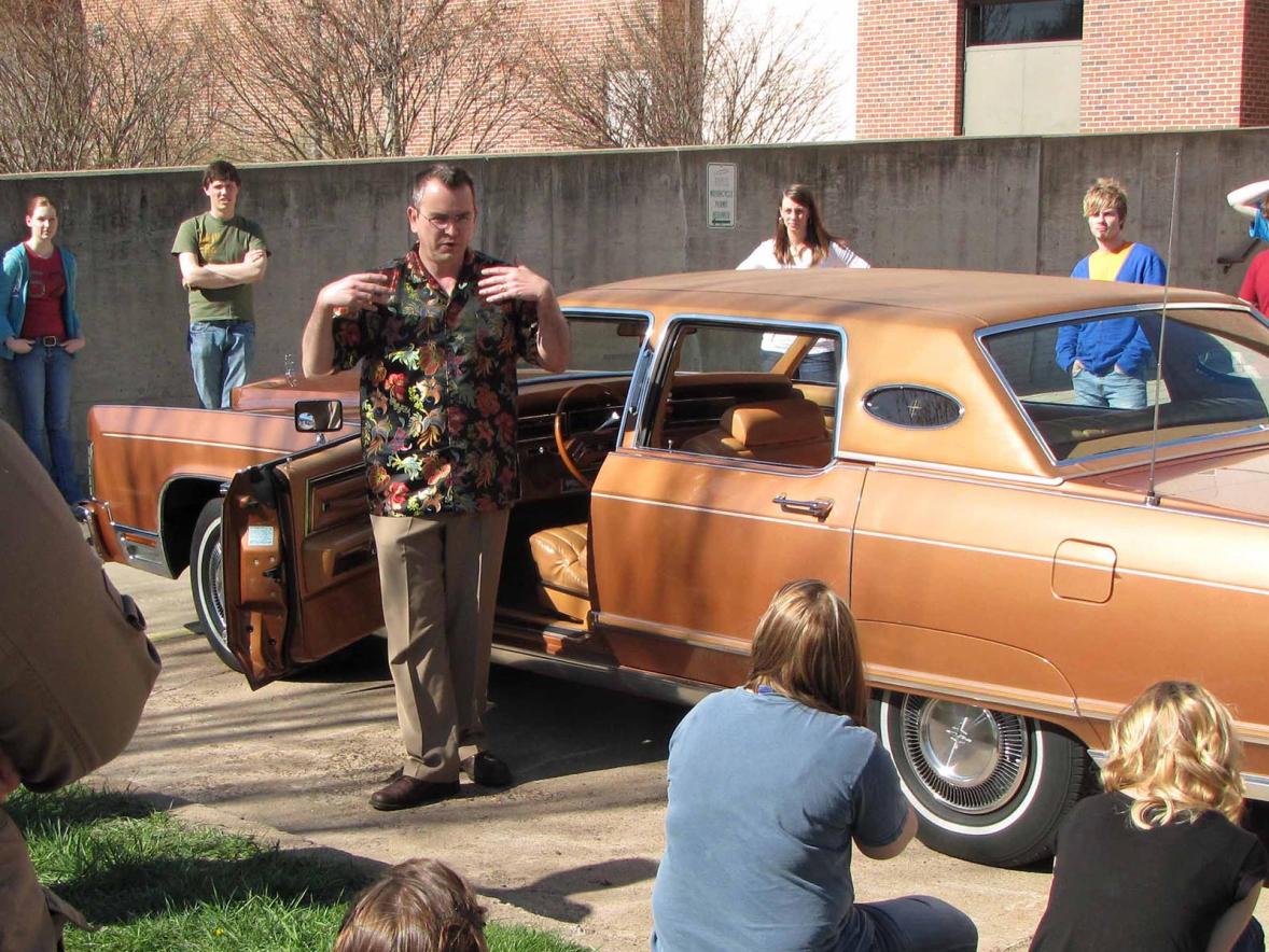 Jim Bryan, center, with a class outside of Applied Arts