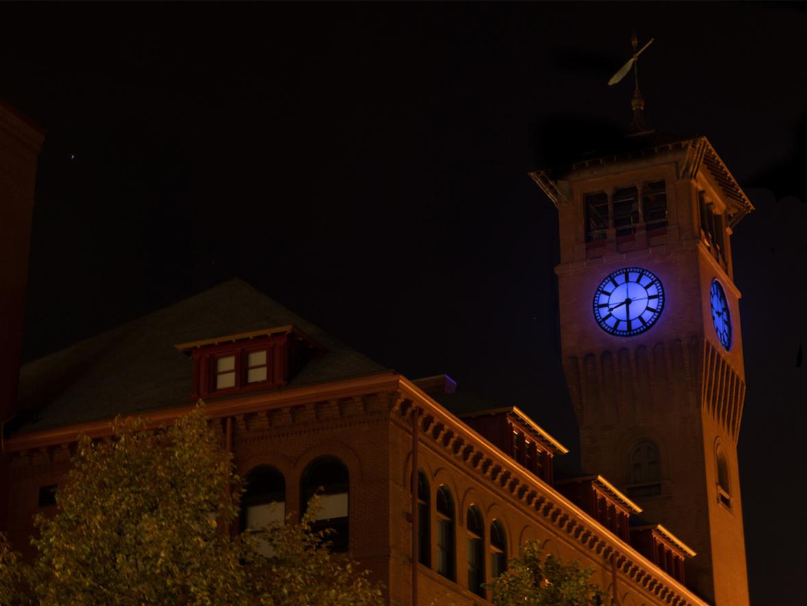 Bowman Hall Clock Tower, illuminated blue