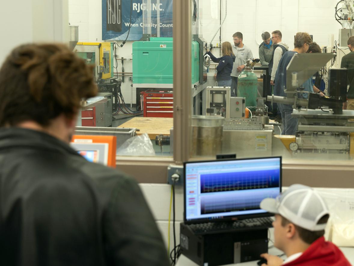 Plastics engineering students work in the UW-Stout Plastics Lab.