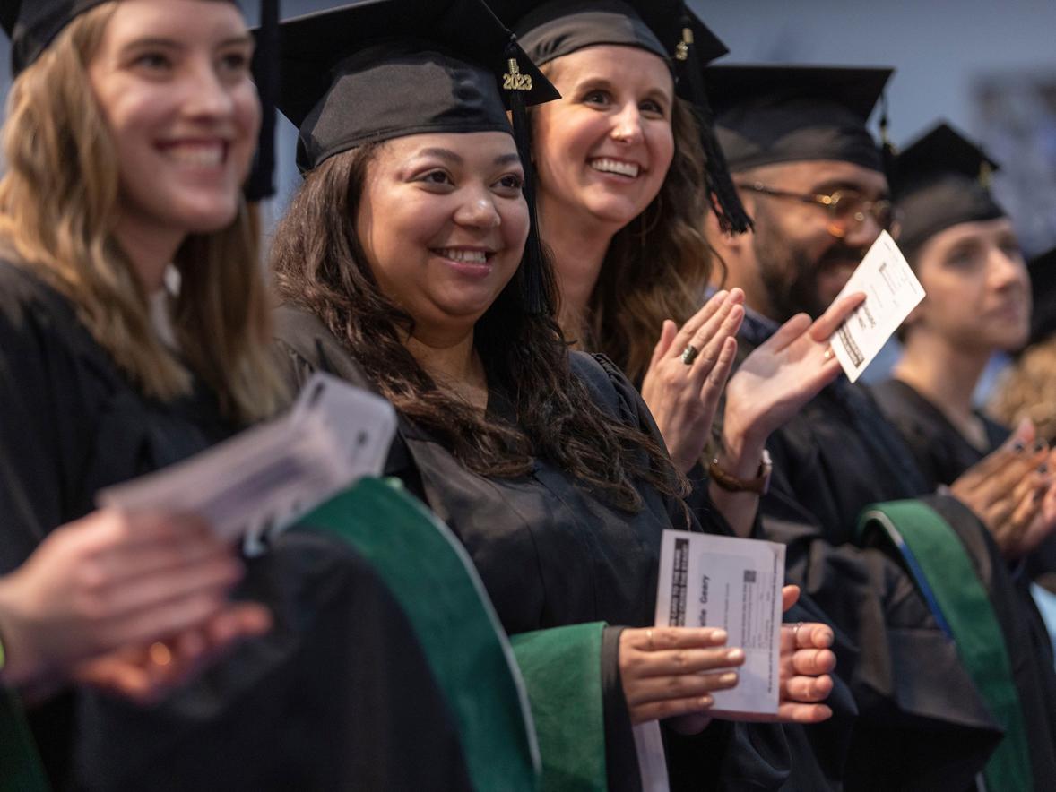 Graduates applaud during one of the three commencement ceremonies May 6 at UW-Stout.