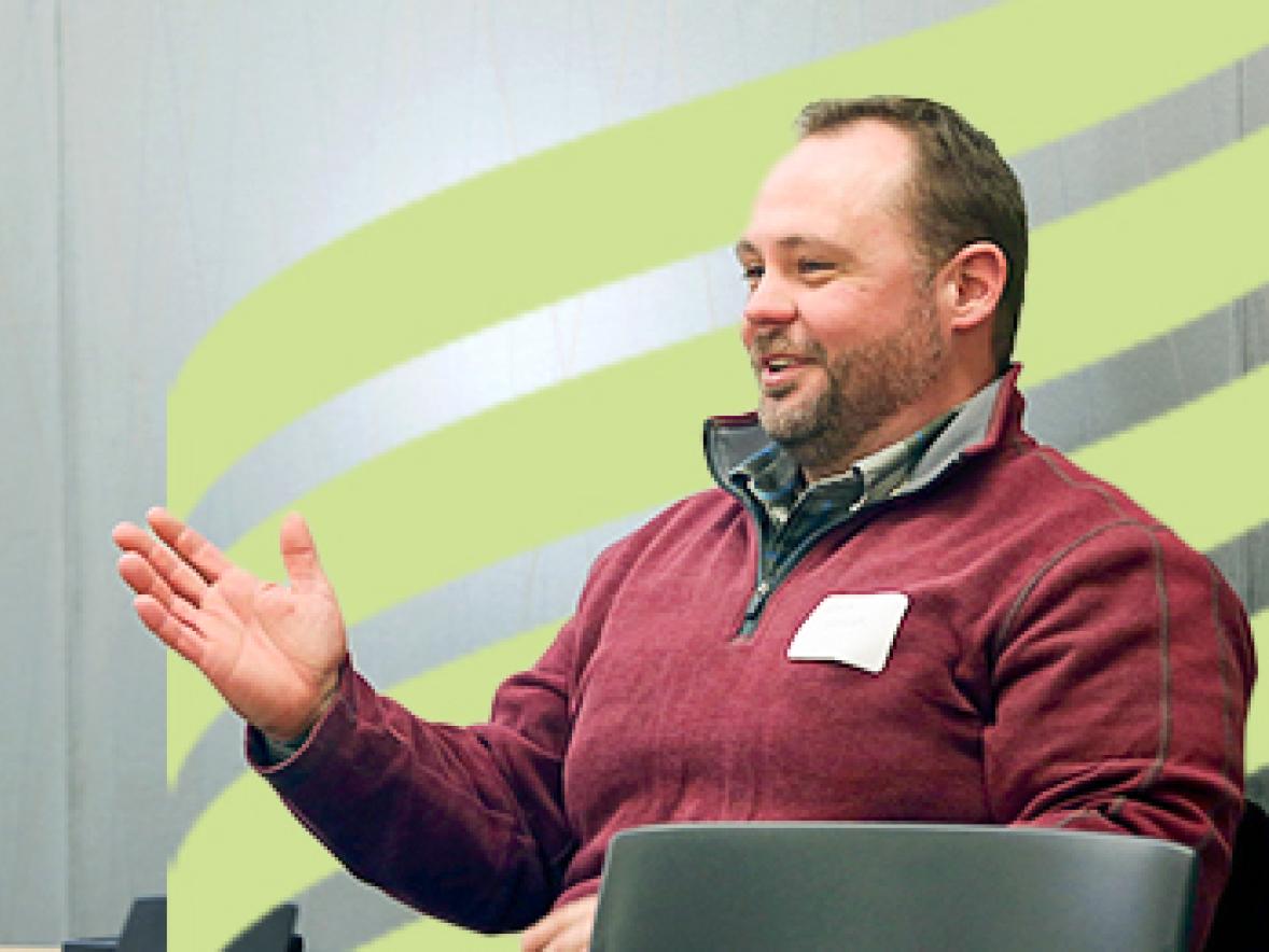 Graduate student engages in classroom discussion at UW-Stout.