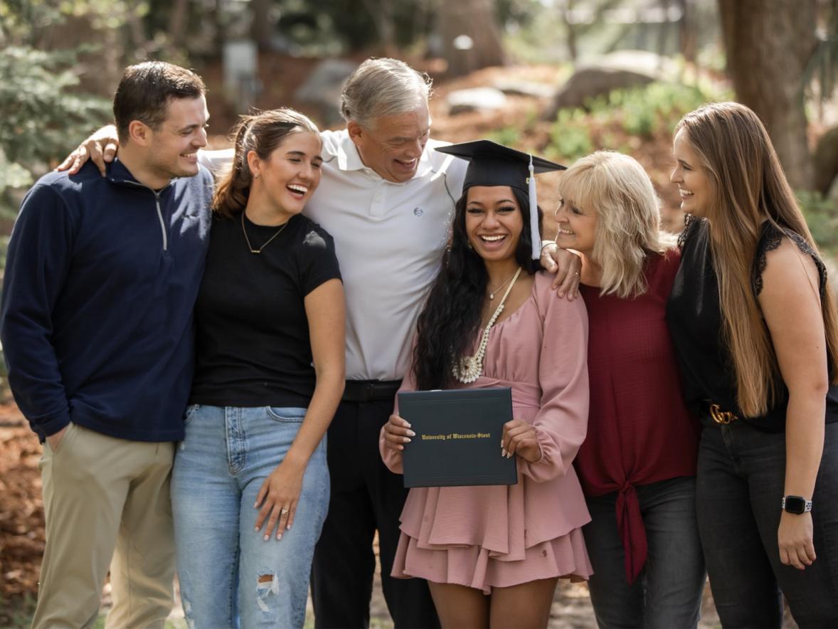Seringa McHugh celebrating her graduation with her family