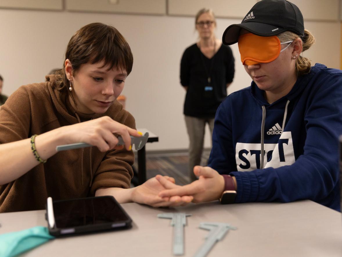 Psychology students use calipers to test the Method of Limits on their fingertips