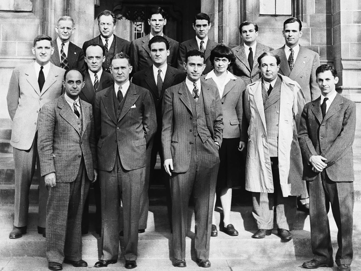 The University of Chicago team that worked on the Chicago Pile-1, the first nuclear reactor, included in the front row Enrico Fermi, left, and Walter Zinn, second from left; and in the second row Harold Agnew, left, Leona Woods, second from right, and Leo Szilard, right. / Los Alamos National Laboratory photo