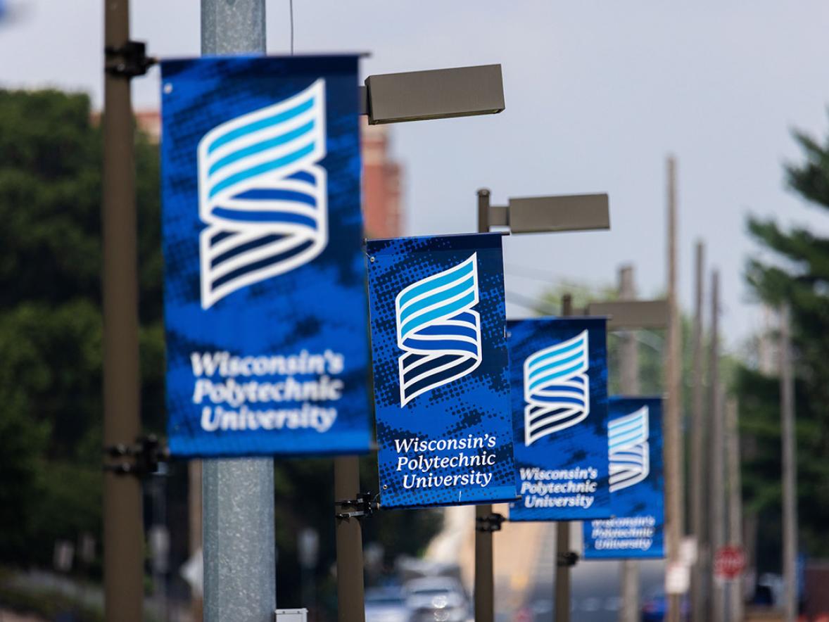 Blue banners with UW-Stout logo