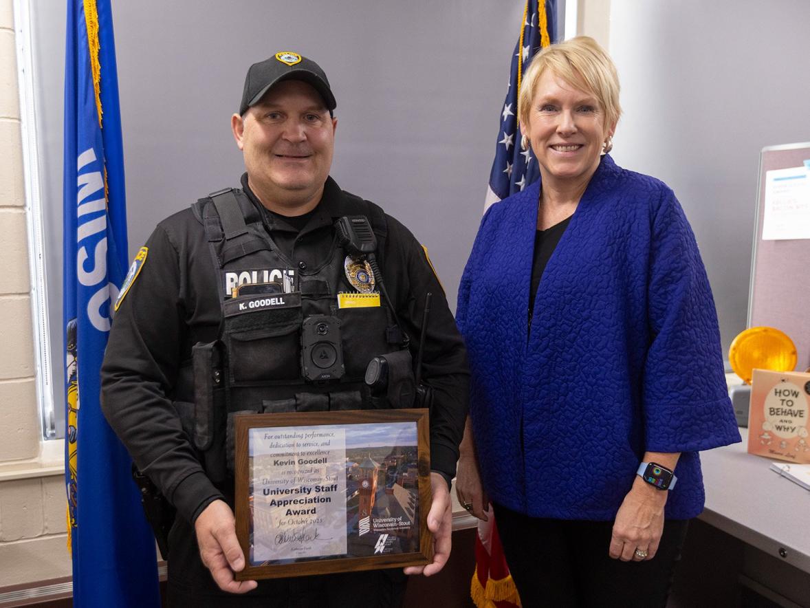 Officer Kevin Goodell and Chancellor Katherine Frank